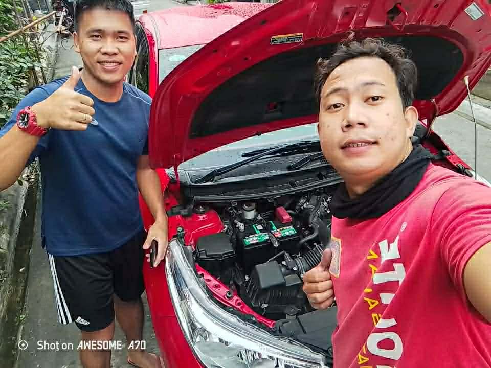 Technician installing battery